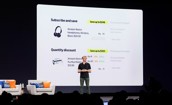 Amazon Business Vice President presenting Savings Insights on stage at the Reshape conference